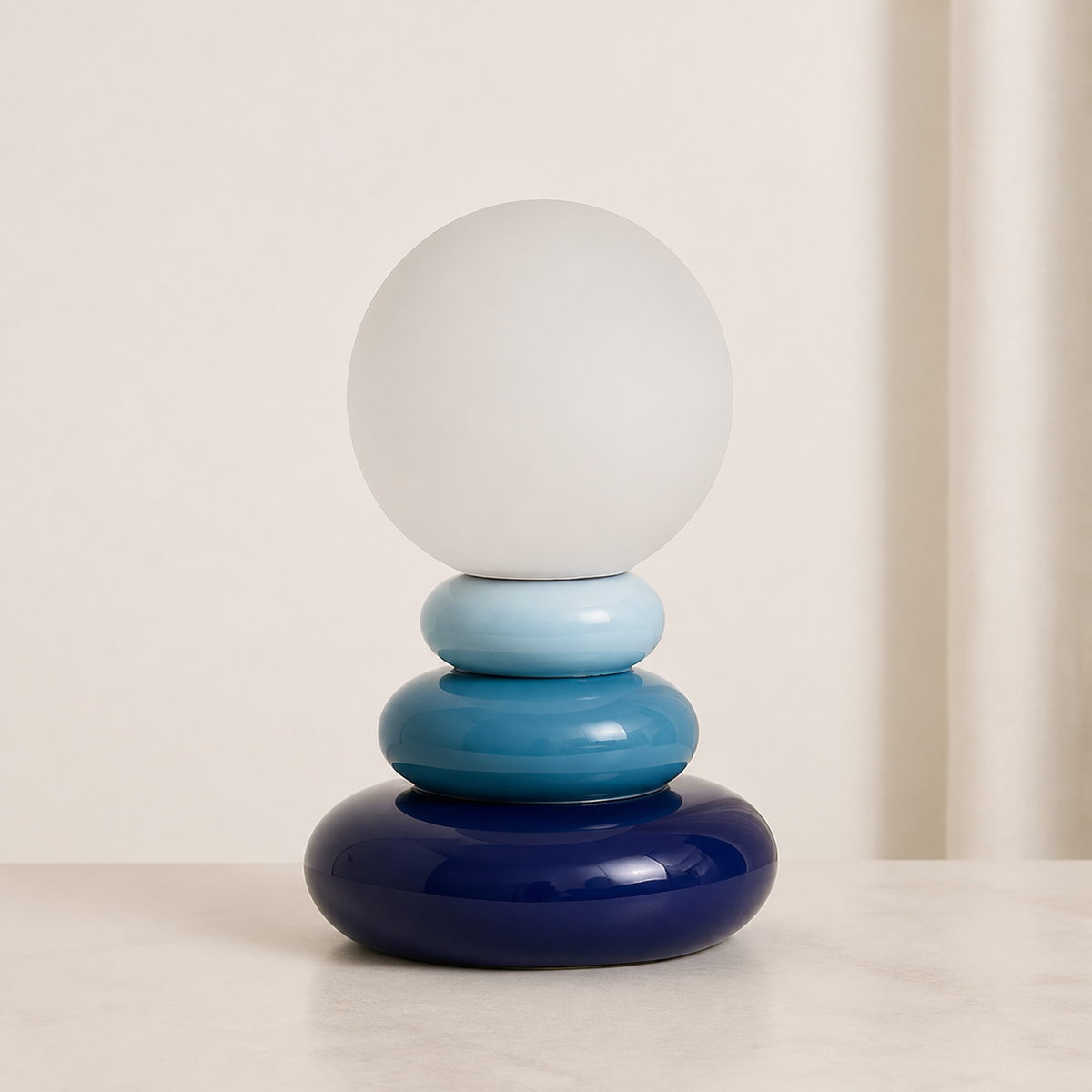 
Stone Cairn – Ceramic Stacked Stone-Style Table Lamp - studio view