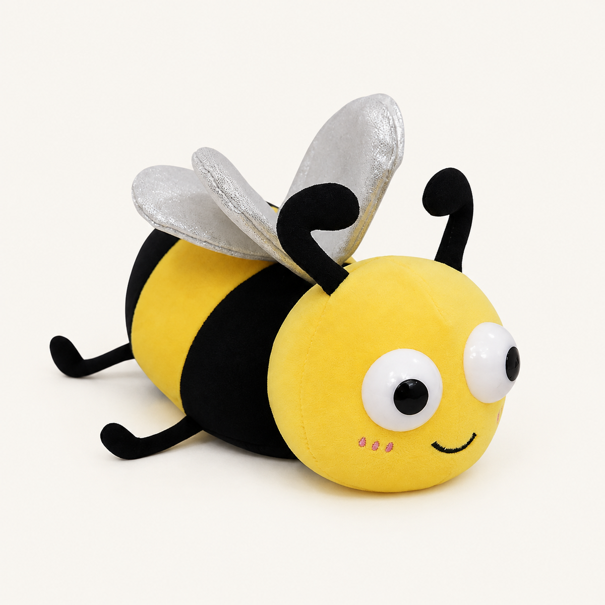 
ObiBuzzy – Light-Up Insect Plush Pillow - studio view