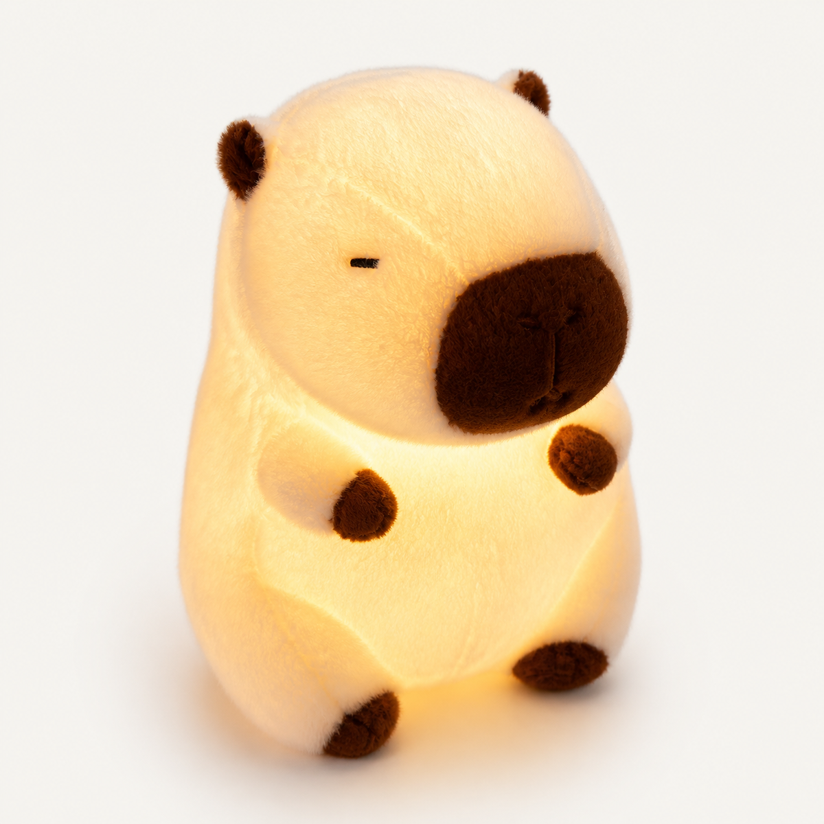 
ObiCuddles – LED Light-Up Capybara Plush Toy - studio view