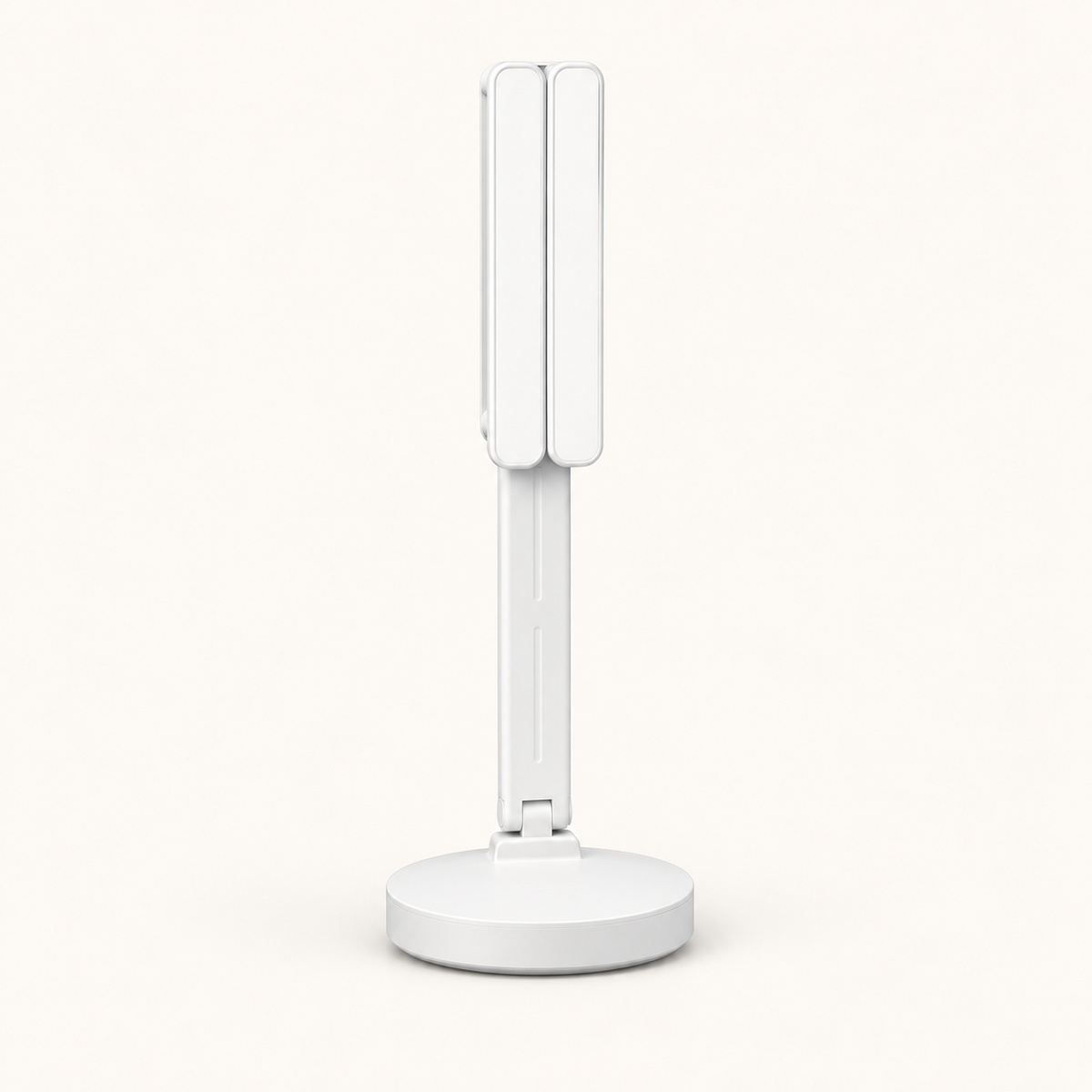 
twin-wing-folded-studio — authentic round-base Twin Wing lamp