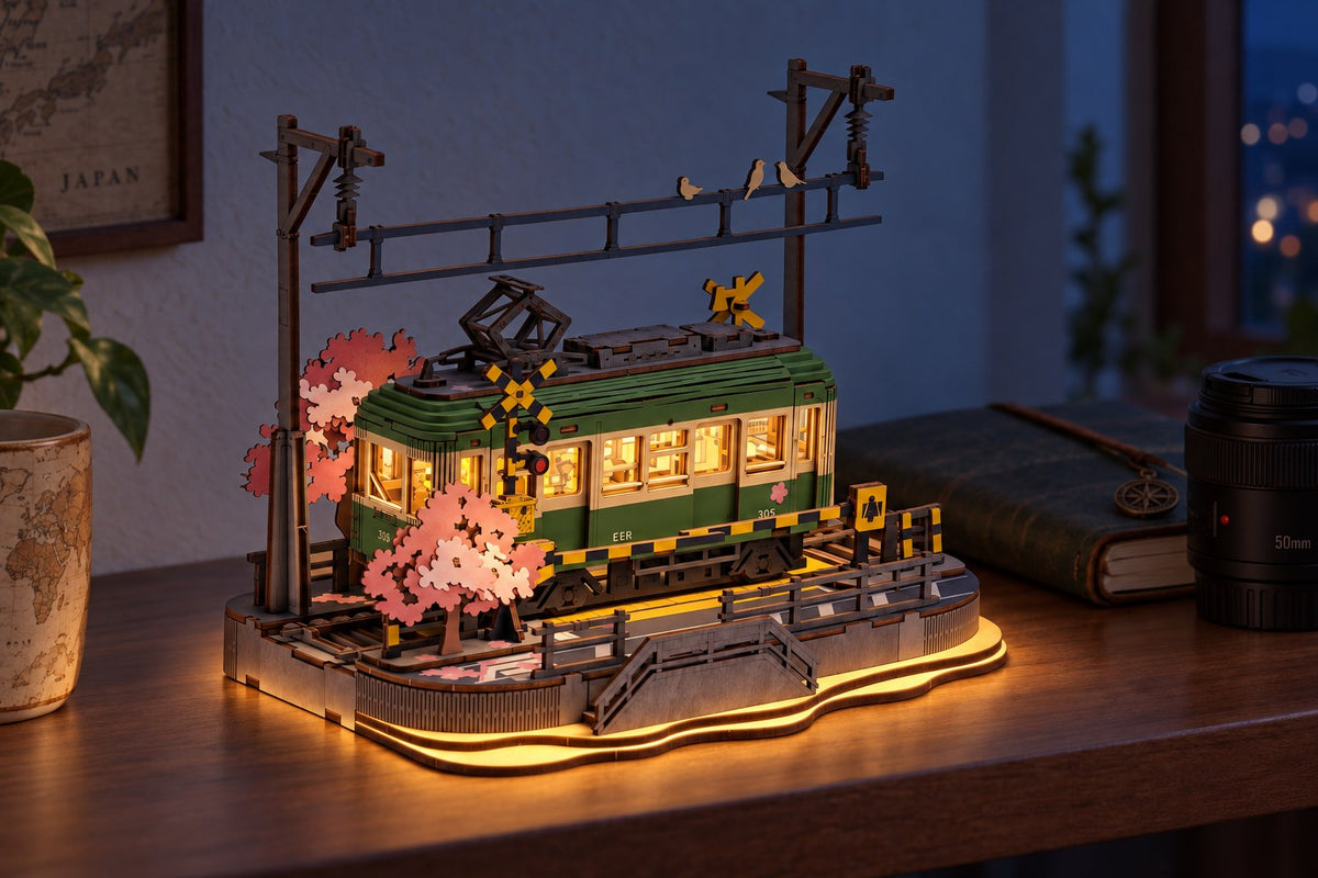 Cherry Tram – Wooden Tram Model Kit with LED Lights with the light switched on